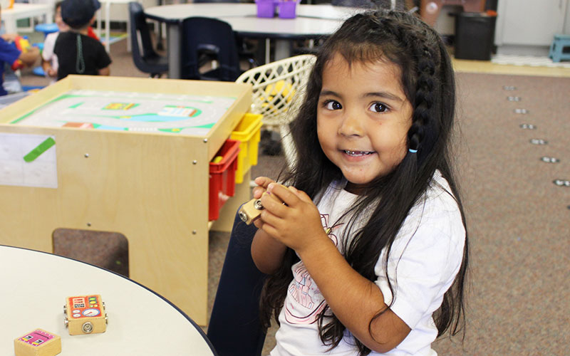 cute little girl in classroom