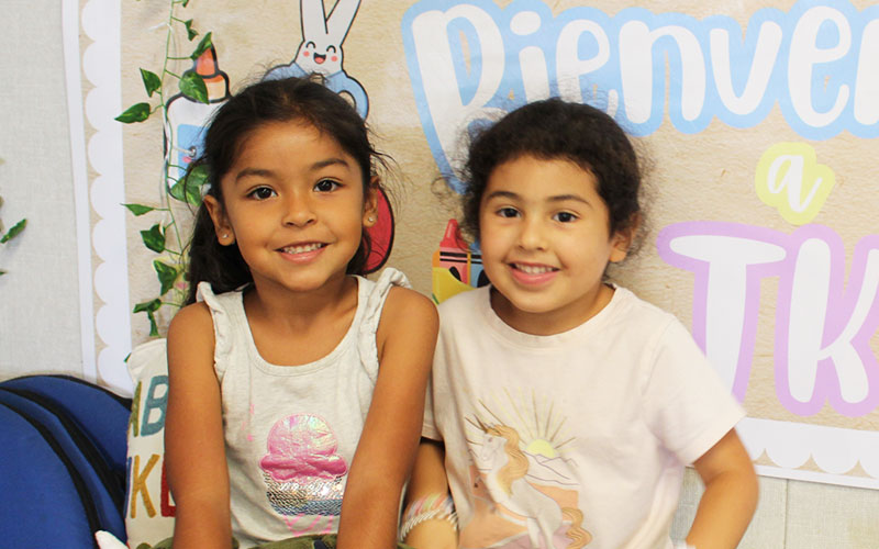 friends posing in classroom
