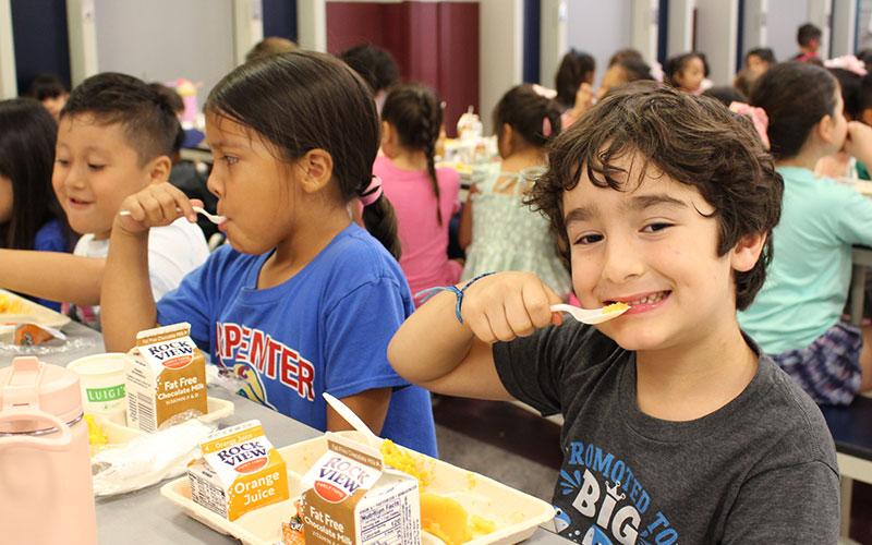 eating lunch in cafeteria