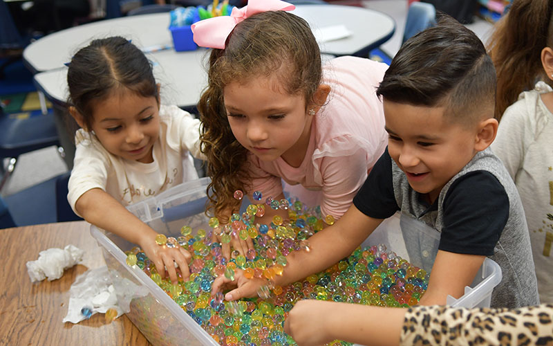 Three students working together