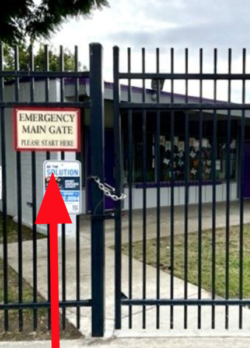 Image of the main gate with sign that says start here.