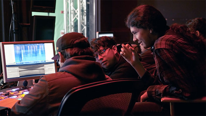 student with gaming chairs