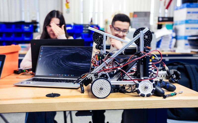 students working on a robotics project