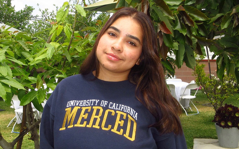 student in a merced shirt