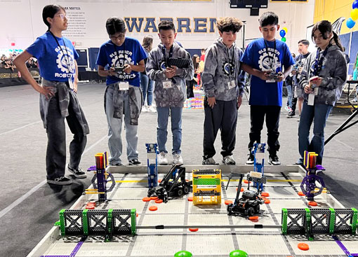 students at a robotics competition