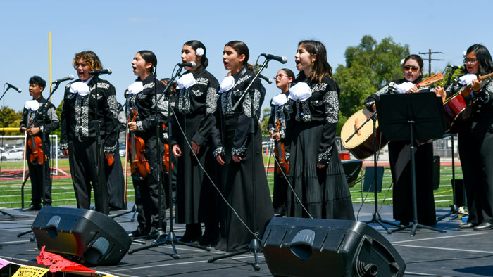 Mariachi performers on stage