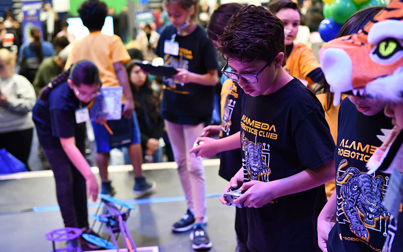 students in robotics competition