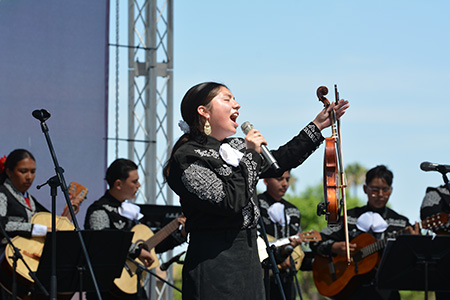 young student performer singing at the downey unified mariachi music festival 2026