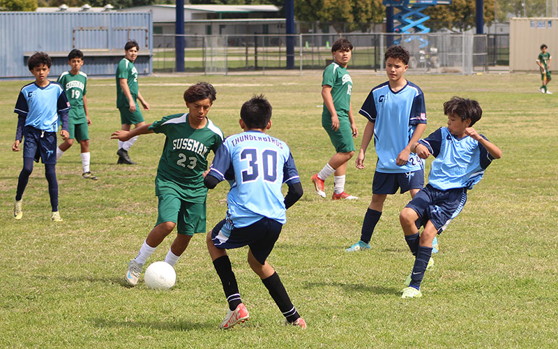 Boys playing soccer
